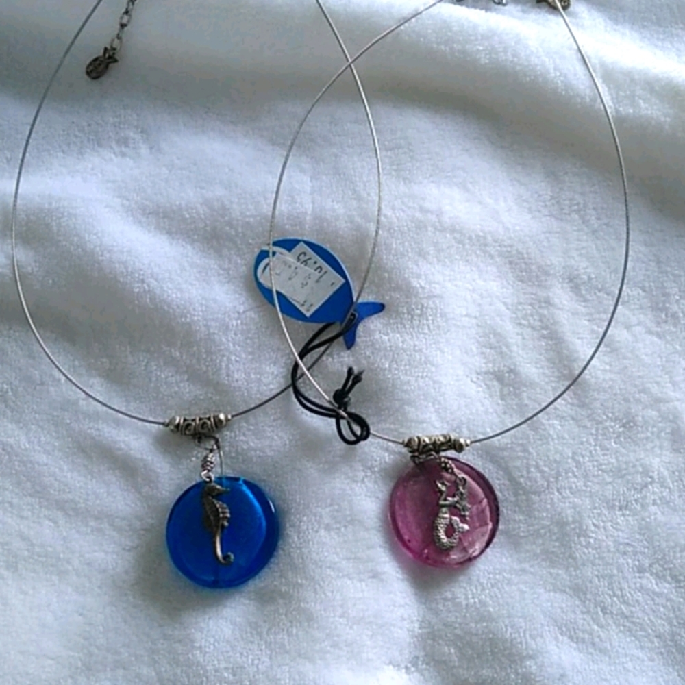 2 silver colored glass seashore necklaces